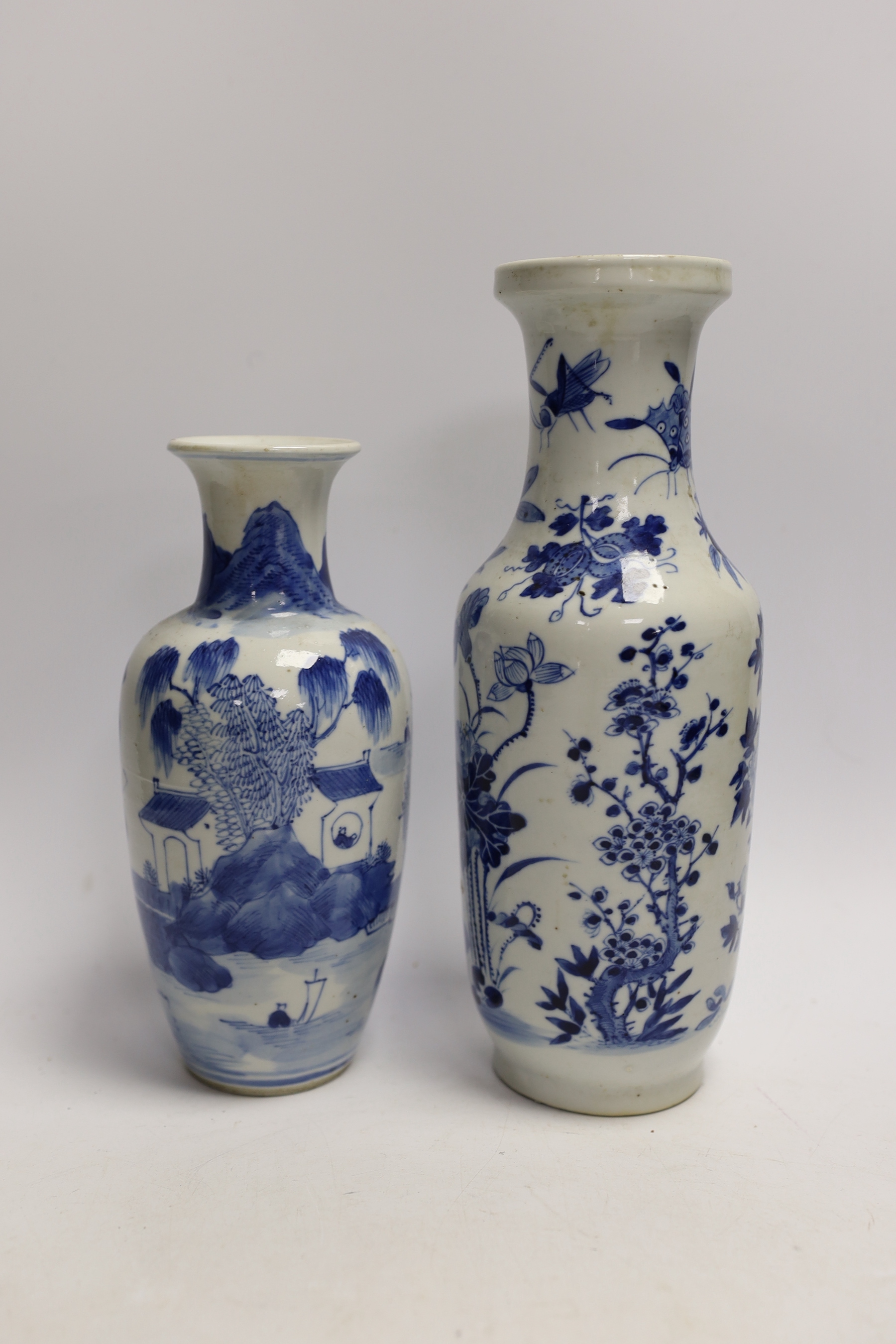 A 19th century Chinese blue and white vase together with another early 20th century vase